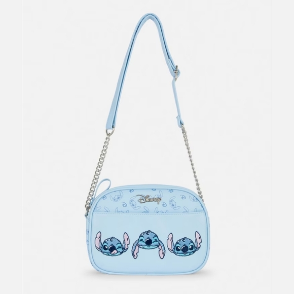 Disney Handbags - Disney’s Stitch Camera BagLight blue camera bag featuring Stitch, a chain strap